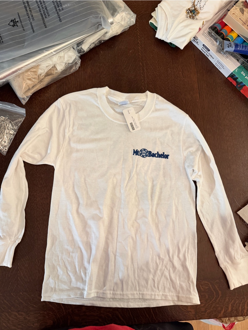 White Oregon Long Sleeve Tee with Centered Blue Ski 'Mt Bachelor' Logo